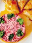  ?? CJ KATZ ?? Holubtsi cabbage rolls are folded into a triangular shape and servedwith a side salad.