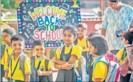  ?? SATISH BATE/HT PHOTO ?? While some bid a tearful adieu to their parents, this group of children seems eager to start their first day at Orion School, Vile Parle on Wednesday.
