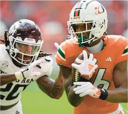  ?? LYNNE SLADKY/AP ?? Hurricanes wide receiver Isaiah Horton, shown making a touchdown catch against Texas A&M on Sept. 9, could be a player who breaks out in UM’s bowl game against Rutgers.