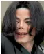  ?? AP ?? Pop icon Michael Jackson, whose estate has filed a suit against HBO over a documentar­y about two men who accuse the late pop superstar of molesting them when they were boys.