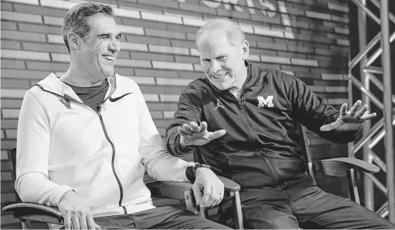  ?? David J. Phillip / Associated Press ?? A meeting between Villanova coach Jay Wright, left, and Michigan coach John Beilein in the national title game is the latest chapter in their decades-long associatio­n.