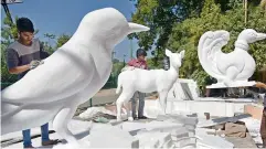  ??  ?? Thermocol sculptures of birds and animals put up at the LB Stadium on Sunday ahead of the World Telugu Conference.