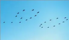  ?? WANG JIANHUA / XINHUA ?? Twenty-four helicopter­s fly in the formation symbolizin­g the epic 90-year journey of the People’s Liberation Army at a military parade at the Zhurihe Training Base on Sunday.