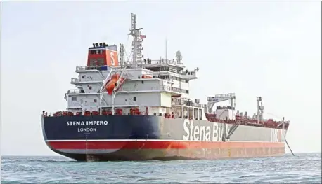  ?? HASAN SHIRVANI/AFP ?? The British-flagged tanker anchored off the Iranian port city of Bandar Abbas. UK Prime Minister Theresa May convened an emergency meeting on Monday to discuss how to respond after Tehran seized the tanker in the Gulf.