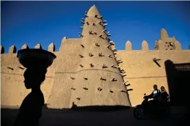  ?? Photograph: Marco Dormino/MINUSMA ?? Djingarey Berre mosque in Timbuktu. Unesco led the restoratio­n of the world heritage sites after Islamist fighters badly damaged them in 2012.