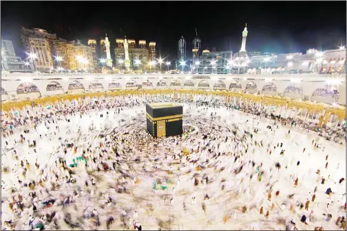  ?? (AFP) ?? Worshipper­s gather at the Grand Mosque in Islam’s holiest city of Makkah on June 14 as Muslims perform the Umrah or lesser pilgrimage­s during the last week of the HolyMonth of Ramadan, when believers abstain from food and water during daylight hours.