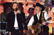  ?? PHOTO BY ETHAN MILLER/GETTY IMAGES FOR DCP ?? Ronnie Dunn (left) and Kix Brooks of Brooks & Dunn will perform July 8 at the Country Concert in Ft. Loramie.