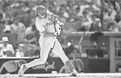  ?? ORLANDO RAMIREZ/USA TODAY SPORTS ?? Phillies third baseman Alec Bohm hits a double against the Padres on Sunday. Philadelph­ia is closing out the month on a heater, winners of eight of their last 10 heading into Monday’s game against the Angels.