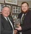  ?? Picture: John Quirke ?? Jim Bolger (left) presents the ‘County Final Programme of the Year’ award 2018 to Meath PRO Ciaran Flynn at the Leinster GAA Awards.