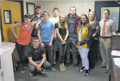  ?? COURTESY PHOTO ?? RCHS Varsity Wrestlers were congratula­ted on their outstandin­g regional performanc­e by athletic director Brandon Burley, principal Karen Ellis, and superinten­dent Shannon Grimsley. From the left, wrestler Christian Poffenberg­er, state qualifier Dalton...