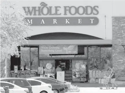  ?? MATT YORK/AP ?? New owner Amazon is moving swiftly to make big changes at Whole Foods, with plans to aggressive­ly cut prices.