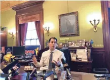  ?? MOLLY BECK/MILWAUKEE JOURNAL SENTINEL ?? Gov. Scott Walker speaks to reporters for the first time since his Nov. 6 loss to Tony Evers.