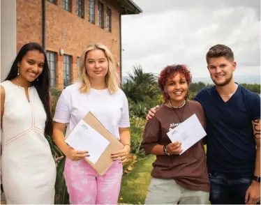  ?? ?? Grace College’s top matric candidates, Isha Ghoorah, Larissa van Wyk, Mary-Beth Wilson and Cole Baker, are pictured collecting their matric results.