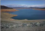  ?? DAN REIDEL — ENTERPRISE-RECORD ?? Lake Oroville is at 718 feet elevation Monday in Oroville. The lake is slowly filling as water from the Feather River fills the reservoir with little being let out, but it is only about 53 percent of average for this time of year.