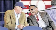  ?? HEATHER AINSWORTH / ASSOCIATED PRESS ?? Hall of Famers Goose Gossage (left) and Rickey Henderson enjoy an awards ceremony at Doubleday Field on Saturday in Cooperstow­n, New York.