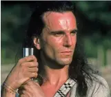  ?? ?? Hero: Daniel Day-Lewis in The Last Of The Mohicans and, left, a war club