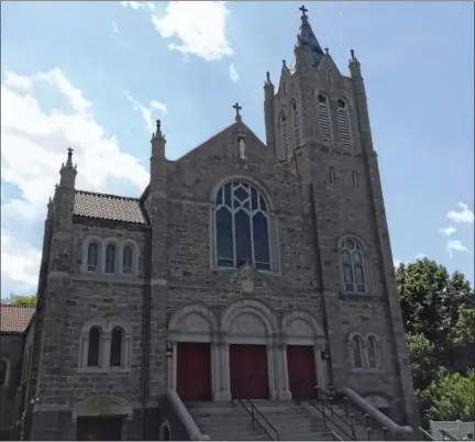  ?? BEN LAMBERT — THE REGISTER CITIZEN ?? St. Mary Parish in Torrington is one of four city Catholic churches are part of a consolidat­ion plan initiated by the Archdioces­e of Hartford.