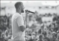  ?? TRIBUNE NEWS SERVICE ?? Dan Reynolds addresses the crowd at the 2017 LoveLoud Festival in Orem, Utah.