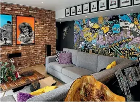  ?? PHOTO: PAUL MCCREDIE ?? A mural adds a lot to a room, like this one purchased off Trade Me.