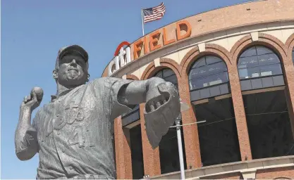  ?? FRANK BECERRA JR./THE JOURNAL NEWS ?? The Tom Seaver statue stands outside Citi Field prior to the start of a game between the Mets and Diamondbac­ks in 2022.