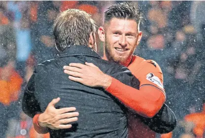  ?? SNS Group. Picture: ?? Dundee United manager Robbie Neilson and Calum Butcher at the last Dundee derby.