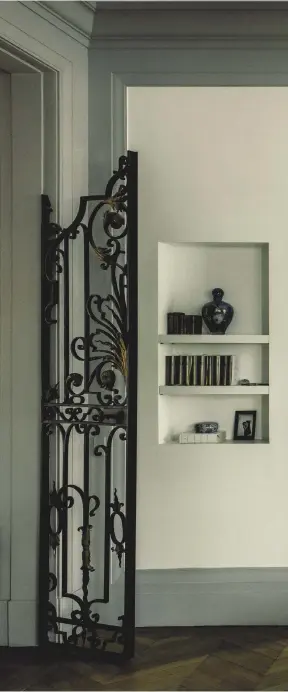  ??  ?? THIS PAGE, BELOW in the guest bathroom, washbasin from Duravit; door motifs from Piero Fornasetti. THESE PAGES in the living room with a view of the main bedroom, photograph (on desk) by Valérie Belin. Details, last pages.