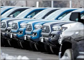  ?? AP ?? Orders for durable goods like these 2019 Tacoma pickups ticked up in January from the previous month.