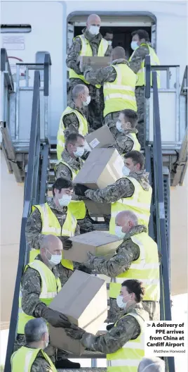  ?? Matthew Horwood ?? > A delivery of PPE arrives from China at Cardiff Airport