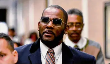  ?? Matt Marton / Associated Press ?? Federal prosecutor­s asked a judge to give singer R. Kelly 25 more years in prison for his child pornograph­y and enticement conviction­s last year in Chicago.