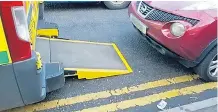  ??  ?? Car is left on double yellows close to ramp of ambulance