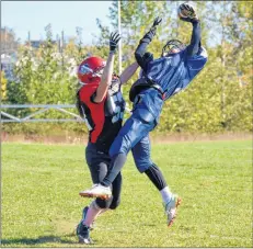  ?? COLIN CHISHOLM ?? An Avon View player leaps high for the ball, but the pass is ruled incomplete during a game against the West Kings Wolverines on Oct. 22, 2017.