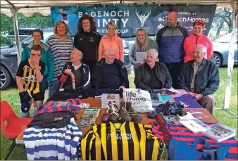  ??  ?? Above: Badenoch Shinty Memories Group, with Shinty Memories ambassador Donnie Grant MBE, front second left, with family and committee members.