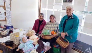  ??  ?? Working in the opportunit­y shop are (from left): Sue Reid, Jan Frowd and Beth Delzoppo.