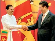  ??  ?? President Maithripal­a Sirisena shakes hands with Chinese President Xi Jinping during former’s state visit to China in March 2015