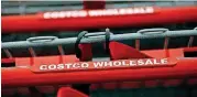  ?? [AP PHOTO] ?? Shopping carts are shown at a Costco Wholesale in Cranberry Township, Pa.