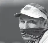  ?? TRIBUNE NEWS SERVICES ?? Florida coach Dan Mullen walks on the field before facing Alabama. The Gators will open their 2021 SEC schedule against the Crimson Tide.