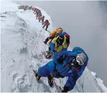  ??  ?? Form a queue: Climbers on Everest