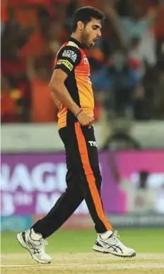  ?? Courtesy: BCCI ?? Bhuvneshwa­r Kumar of Sunrisers Hyderabad celebrates after the win against Royal Challenger­s Bangalore on Monday.