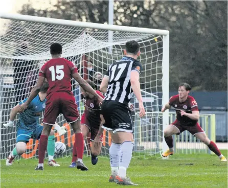  ?? PICTURES: Simon Howe ?? Bath City go 1-0 in front at Chelmsford City on Saturday after Ade Oluwo saw the ball ricochet off him and into his own net