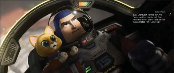  ?? DISNEY/ PIXAR ?? Buzz Lightyear, voiced by Chris Evans, and his robotic cat Sox, voiced by Peter Sohn, face peril in the animated film ‘Lightyear.’