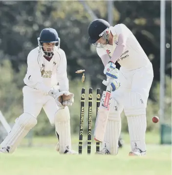  ?? PICTURE: DAVID LOWNDES ?? Bourne’s Ben Stroud is bowled by Adam McDermott of Nassington in the Rutland Division One title decider.