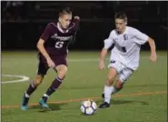  ?? AUSTIN HERTZOG - DIGITAL FIRST MEDIA ?? Pottsgrove’s Ethan Pace works the ball forward against Phoenixvil­le Thursday.