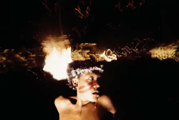  ?? (Claudia Andujar) ?? Antônio Korihana thëri, a young man under the effect of the hallucinog­enic powder yãkoana at Catrimani, 1972-1976