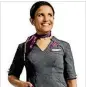  ?? COURTESY ?? Delta Air Lines has rolled out new gray uniform options for those who have reactions to its purple uniforms.