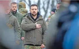 ?? (AFP) ?? Ukrainian President Volodymyr Zelensky taking part in a ceremony in Kyiv, to commemorat­e the 105th anniversar­y of the Battle of Kruty against Bolshevik Red Army, on January 29
