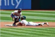  ?? Lachlan Cunningham/Getty Images ?? Esteury Ruiz has been hit by 12 pitches this season, which is the most by any player in the majors.