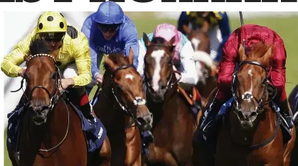  ?? GETTY IMAGES ?? Ascot glory: Andrea Atzeni on Postponed (left) pips Frankie Dettori on Eagle Top (right) to win