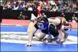  ?? ?? Broomfield’s Samantha White fell to Pomona’s undefeated Timberly Martinez during her state wrestling 130-pound semifinal match at Ball Arena on Friday.