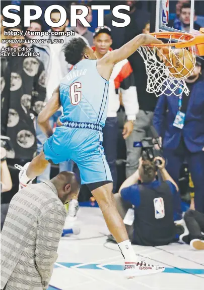  ?? (AP) ?? OKLAHOMA City Thunder Hamidou Diallo leaps over former NBA player Shaquille O’Neal during the NBA All-Star Slam Dunk contest in Charlotte, North Carolina. Diallo won the contest.