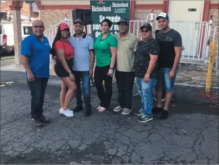  ?? SUBMITTED PHOTO ?? Casa Blanca Restaurant owner Miguel Rodriguez (third from left) celebrated with friends and guests during community party.